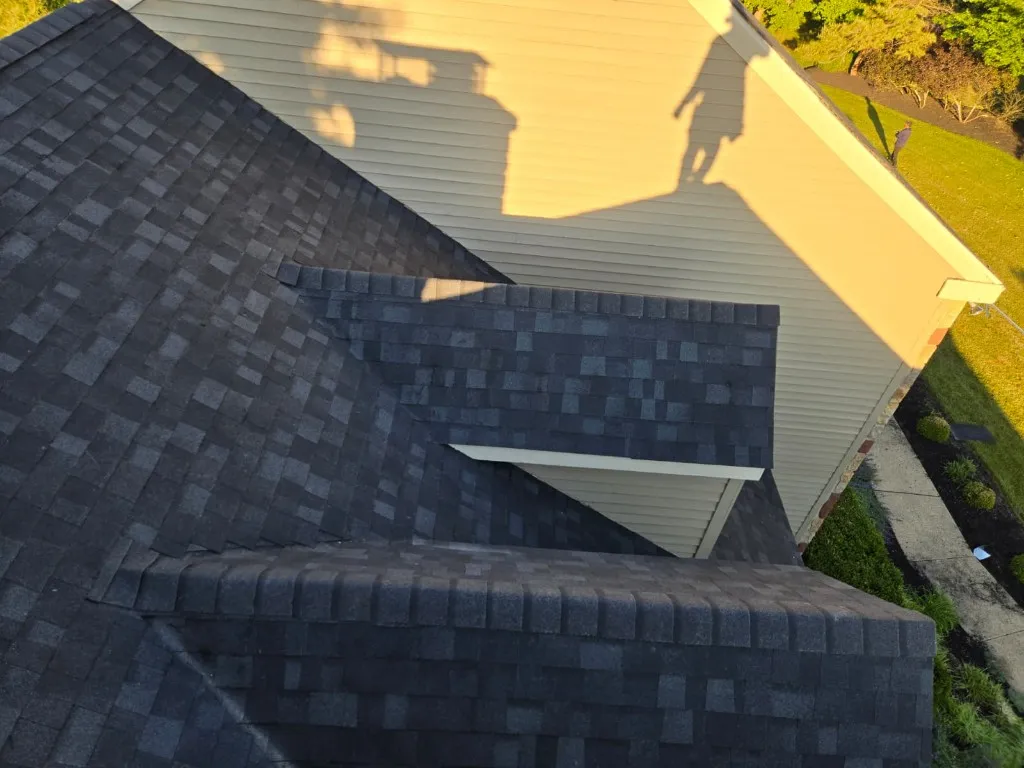 Multi-gabled charcoal architectural shingle roof with valleys inspected in Doylestown, PA